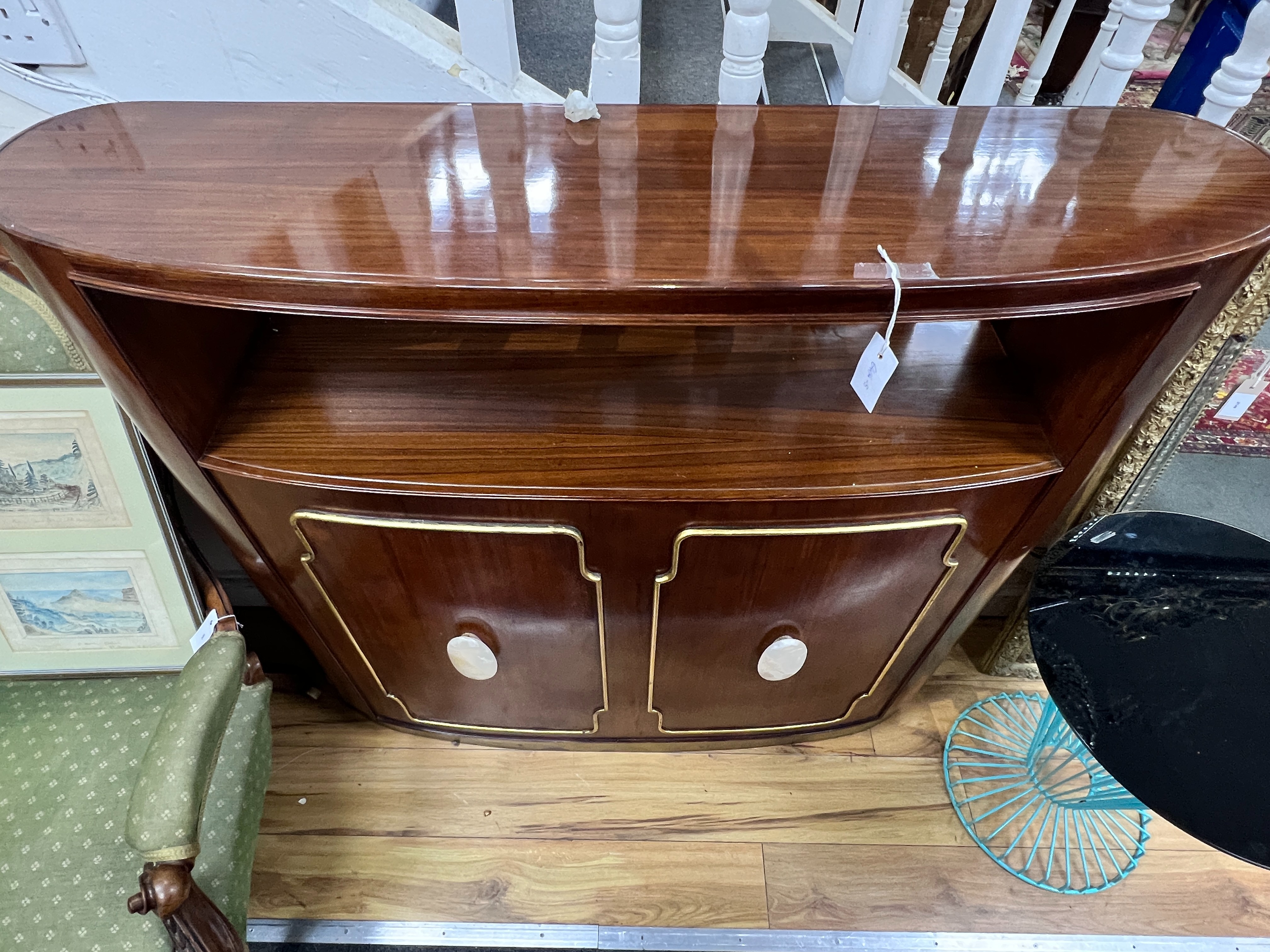 A mid century design Paolo Buffa 'Drybar' or 'Yacht Bar' of bowfront form with faux mother of pearl mounts